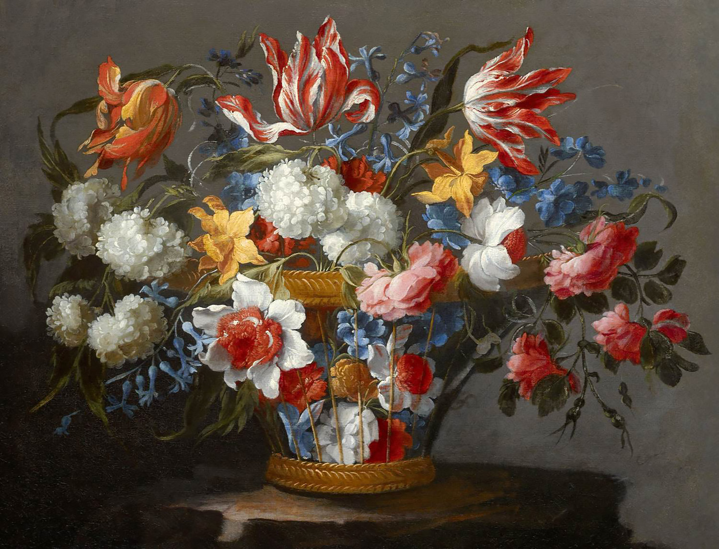a wicker basket with flowers